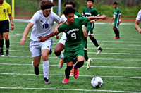 Cross Keys’ Jefferson Diaz (9) gets in front of Bradwell defender Dominic Manznares (18) during firs